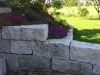 Kamień murowy z granitu, szary, średnie ziarno, łupany