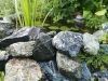 Wasserbausteine aus Serpentin, grüne Wasserbausteine für unterschiedliche Zwecke nicht nur im Garten- und Landschaftsbau. Unterschiedliche Formen und Größen von Wasserbausteinen, grüner Naturstein aus Polen.