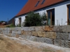 Granit-Mauersteine / Naturstein-Mauer / Granit-Mauer / Wasserbausteine, grau-gelb, Mittelkorn, gespalten (Granit-Mauersteine aus Polen), Mauersteine für eine Natursteinmauer, Polengranit - Foto von unseren Kunden